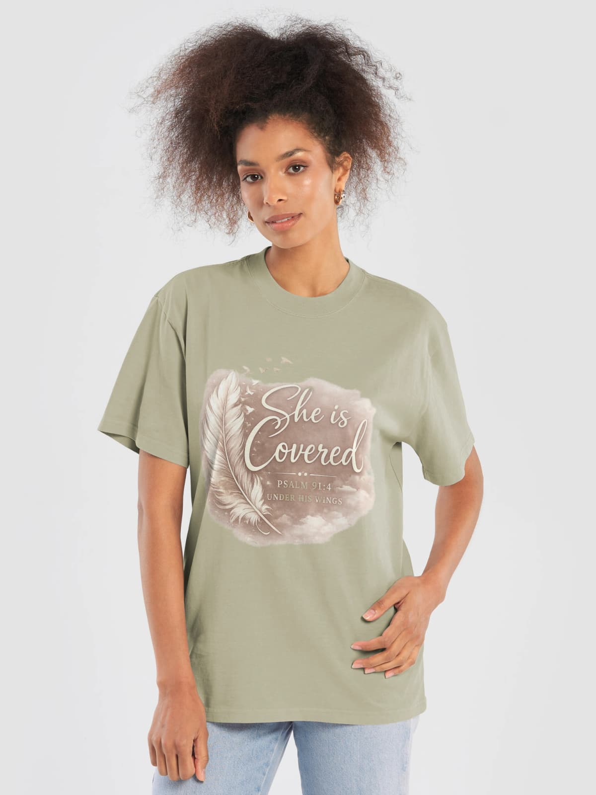 Model wearing She Is Covered Oversized T-Shirt in Faded Eucalyptus - Psalm 91 Christian Streetwear